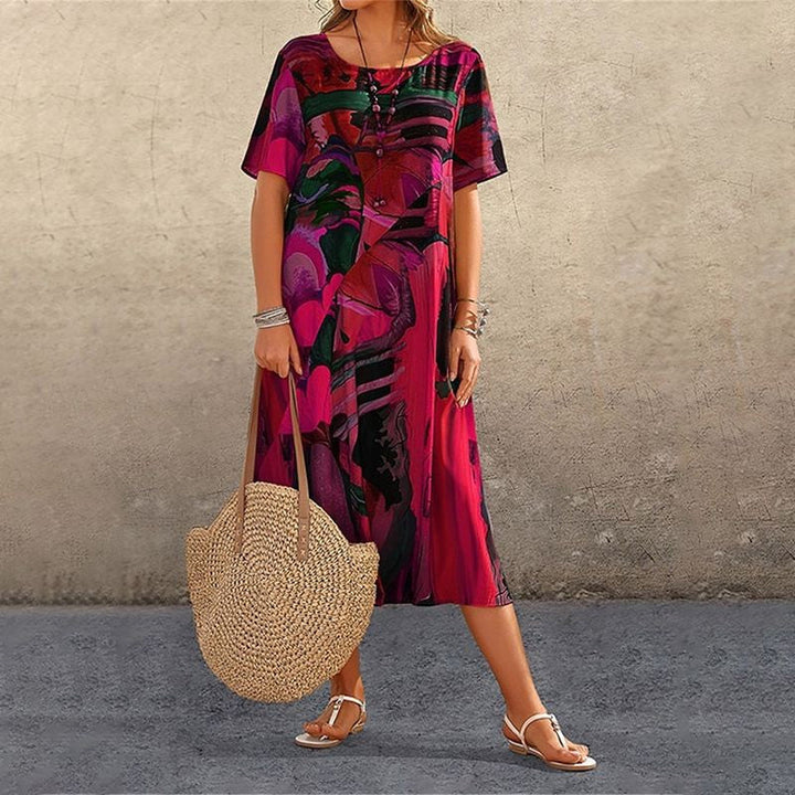 Tori | Lebhaftem Tropenmuster Kleid