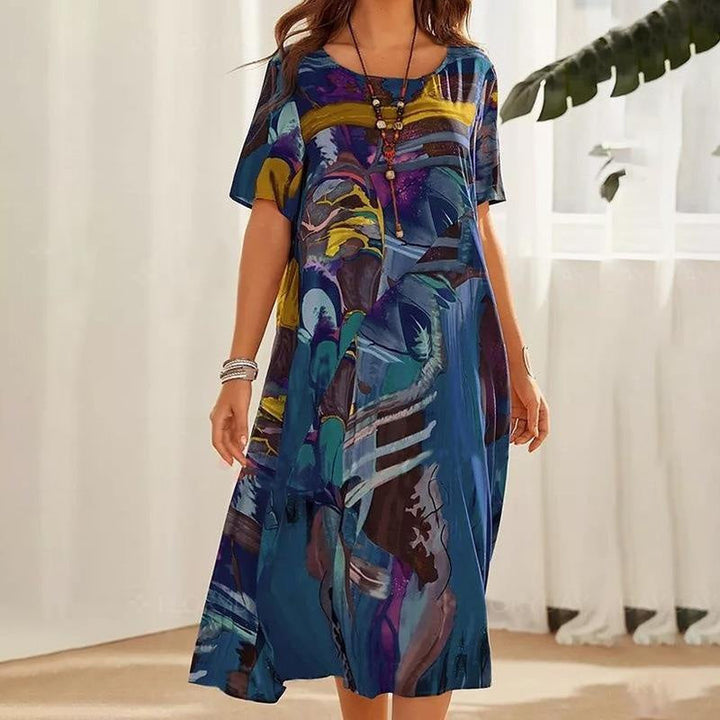 Tori | Lebhaftem Tropenmuster Kleid